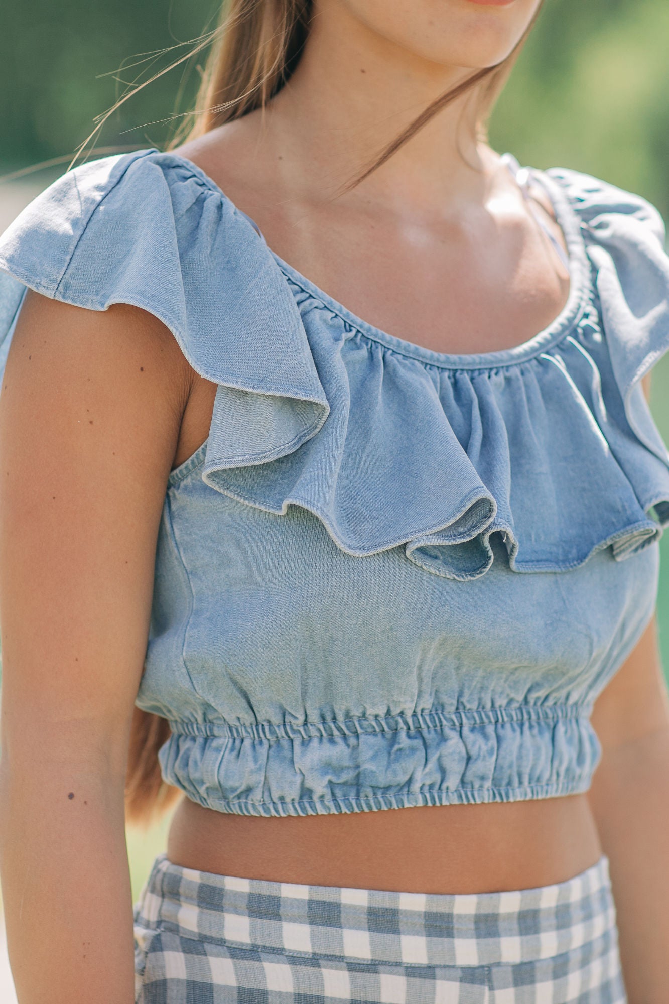 It's Pouring Wide Ruffle Neckline Top
